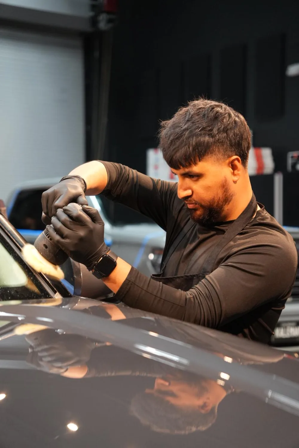Forge Auto Studio owner Christian, mobile detailing and dent repair in Denver